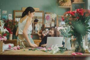 Two women working in a florist