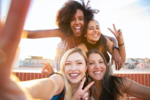 Millennial women taking a selfie